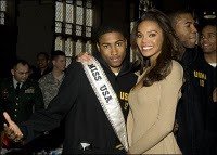 Someone seems pretty happy to be near Miss USA!