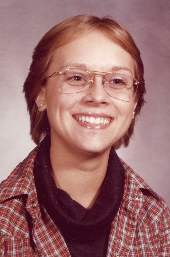 Straight hair, glasses, this was the re-take picture sophomore year! 