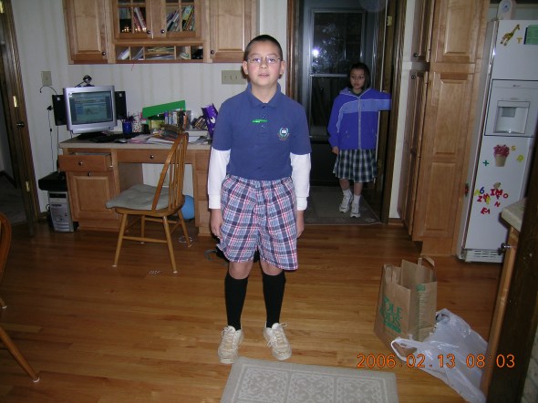 Middle school Ben, hands in pocket, rockin' those plaid pants on Tacky Day.